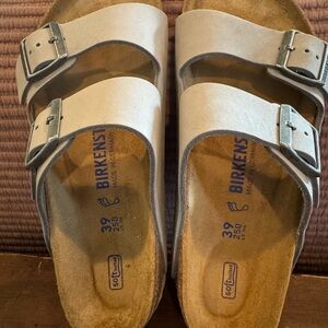 Birkenstock Cream Sandals with Silver Buckles